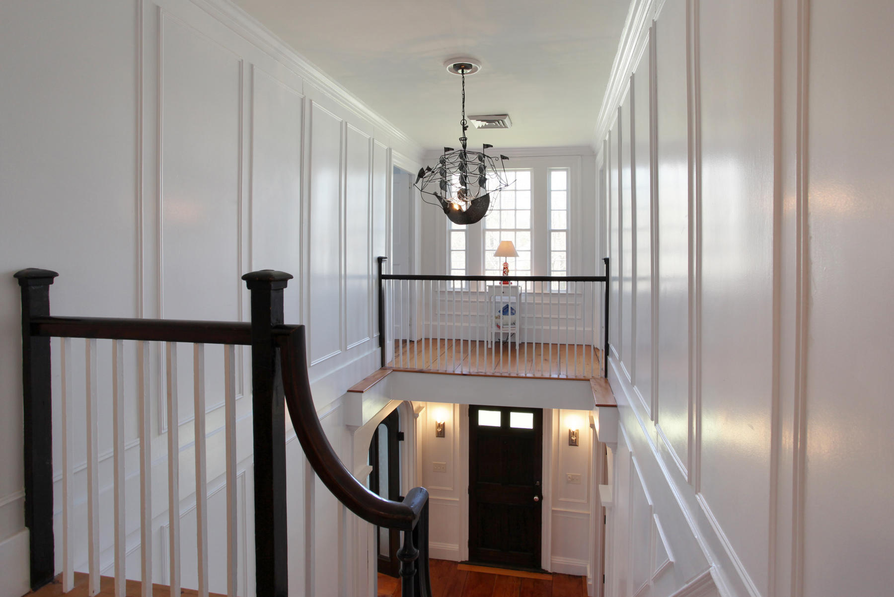 9 East Bay Road Osterville, MA 02655 - Photo 15 of 30 a view of a hallway with wooden floor and staircase