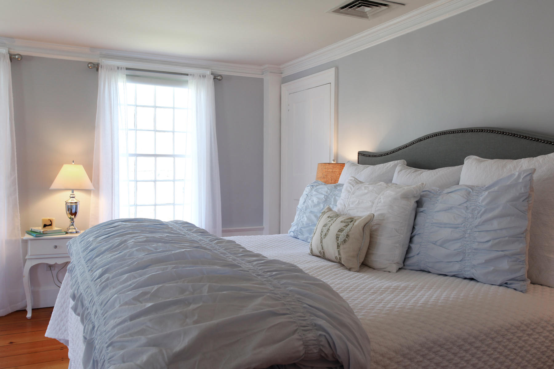 9 East Bay Road Osterville, MA 02655 - Photo 16 of 30 a bedroom with a bed and window