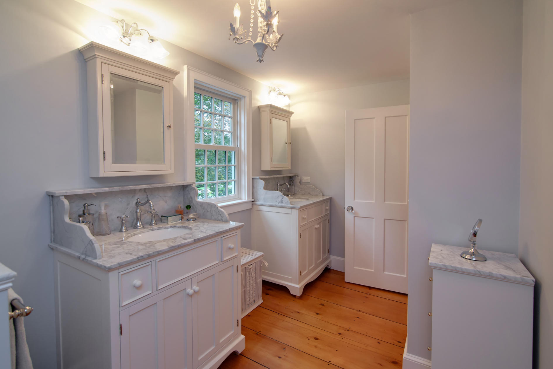 9 East Bay Road Osterville, MA 02655 - Photo 18 of 30 a bathroom with a sink a vanity and a mirror
