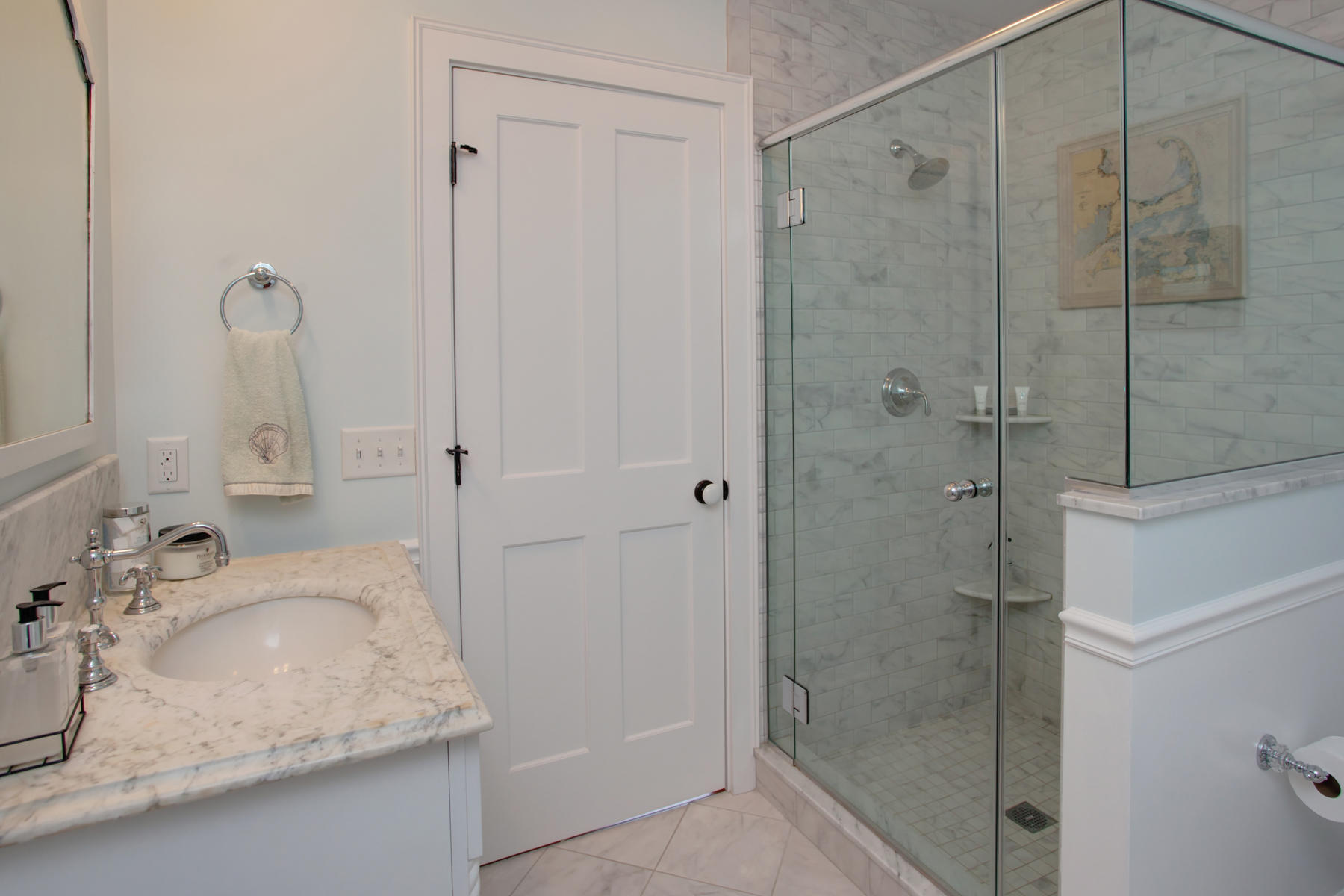9 East Bay Road Osterville, MA 02655 - Photo 23 of 30 a bathroom with a granite countertop double vanity sink and shower