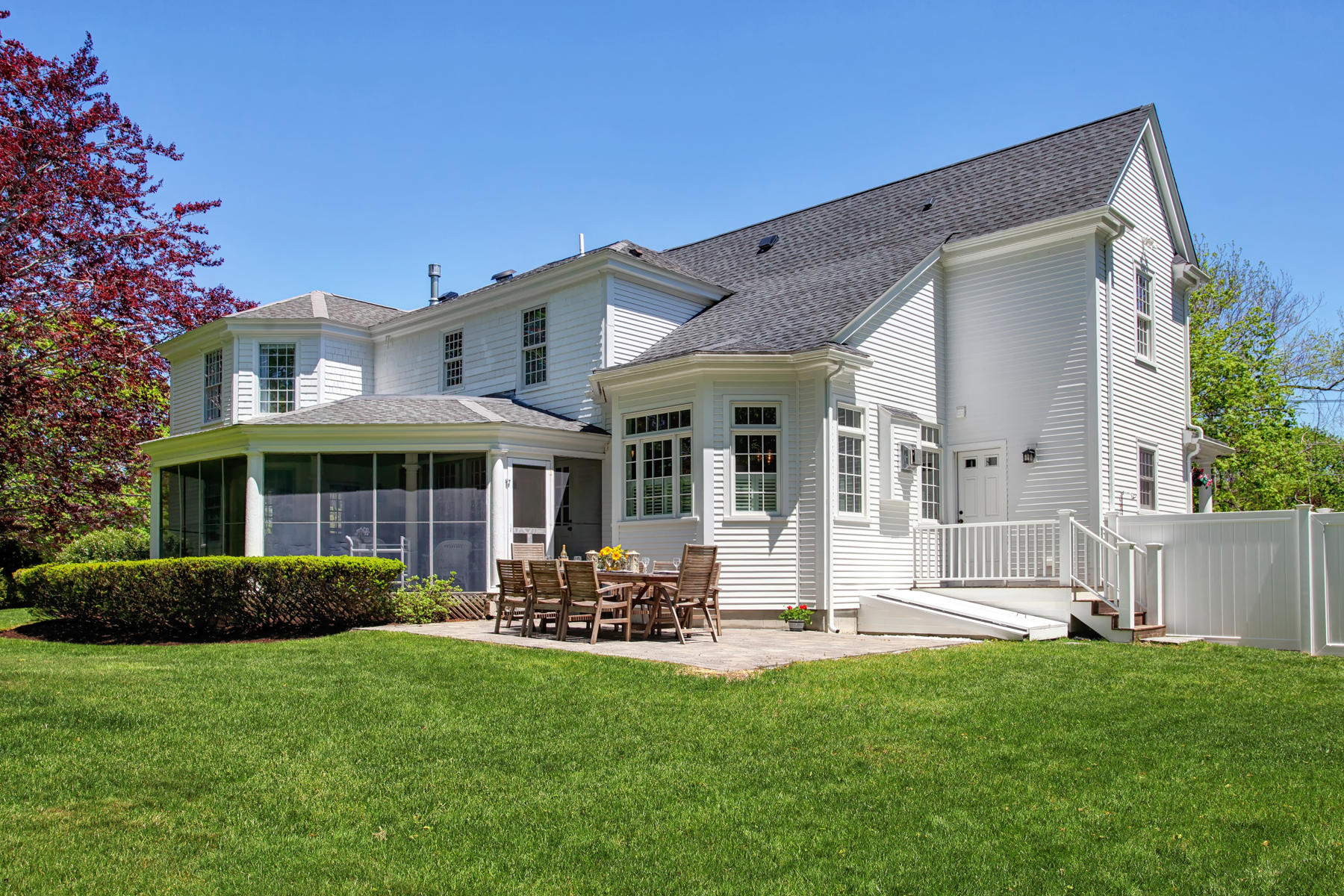 9 East Bay Road Osterville, MA 02655 - Photo 26 of 30 a front view of house with yard and outdoor seating