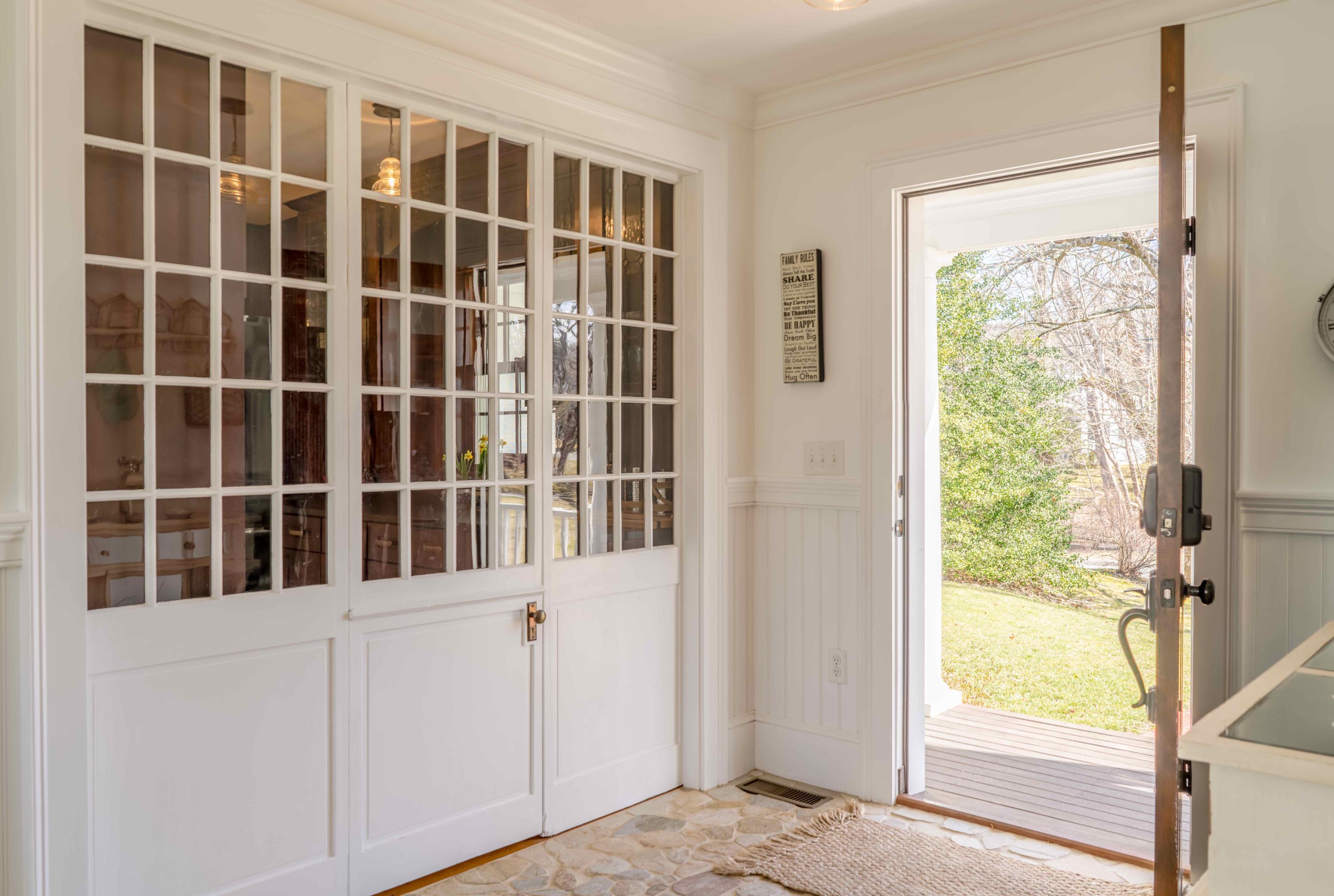 9 East Bay Road Osterville, MA 02655 - Photo 3 of 30 a view of an empty room with a window