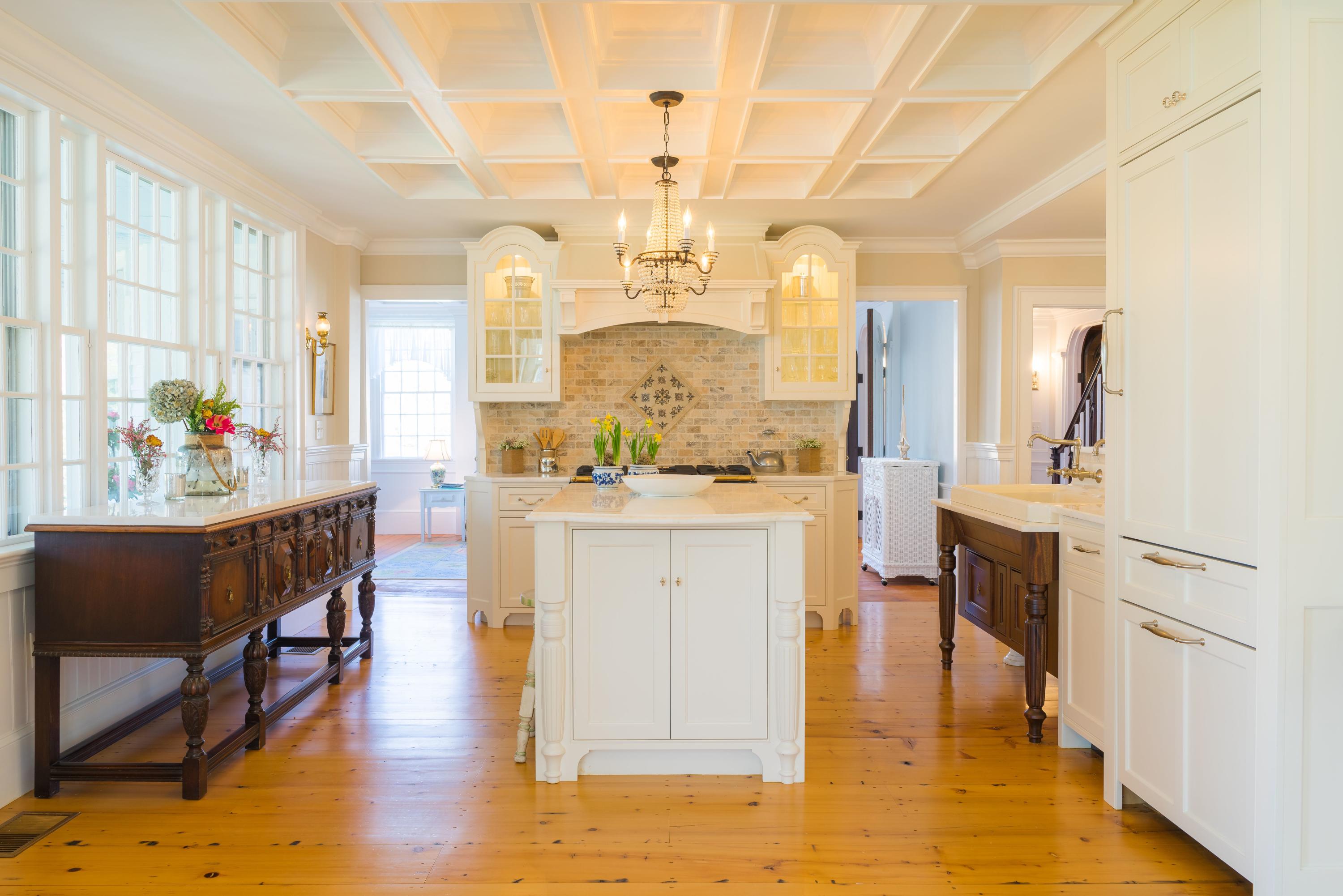 9 East Bay Road Osterville, MA 02655 - Photo 6 of 30 a large kitchen with kitchen island white cabinets and stainless steel appliances