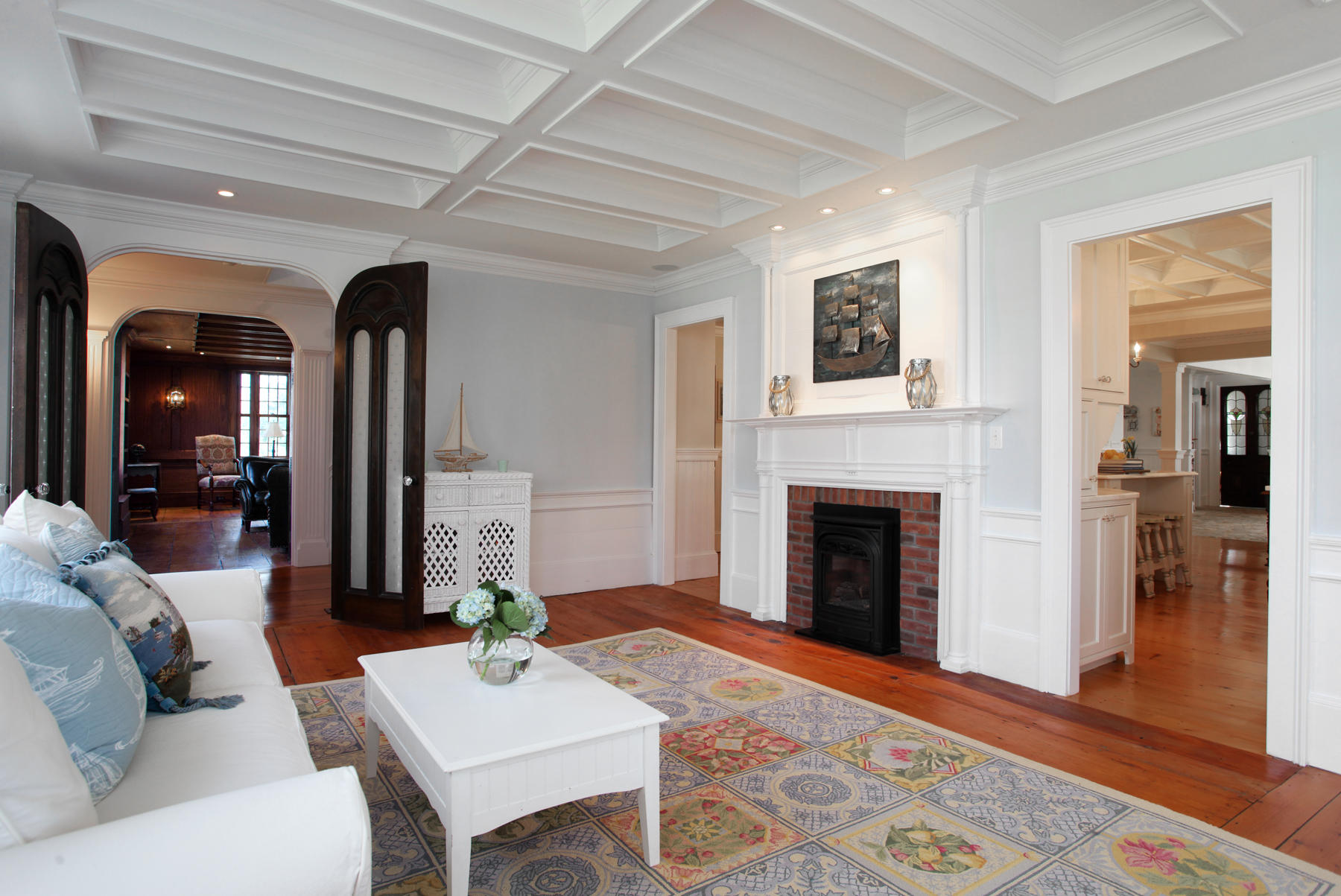 9 East Bay Road Osterville, MA 02655 - Photo 10 of 30 a living room with furniture and a fireplace