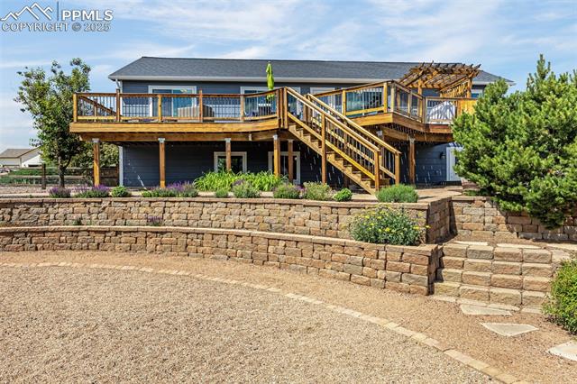 12555 Snaffle Bit Road Peyton, CO 80831 - Photo 7 of 50 40 by 14 deck with hot tub hookup
