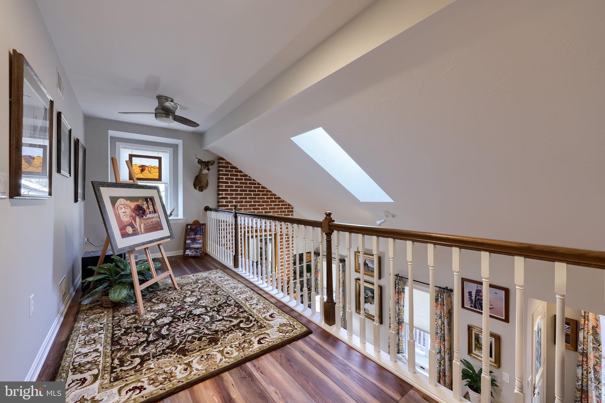 58 Timber Villa Elizabethtown, PA 17022 - Photo 13 of 60 a view of a hallway with wooden floor and stairs