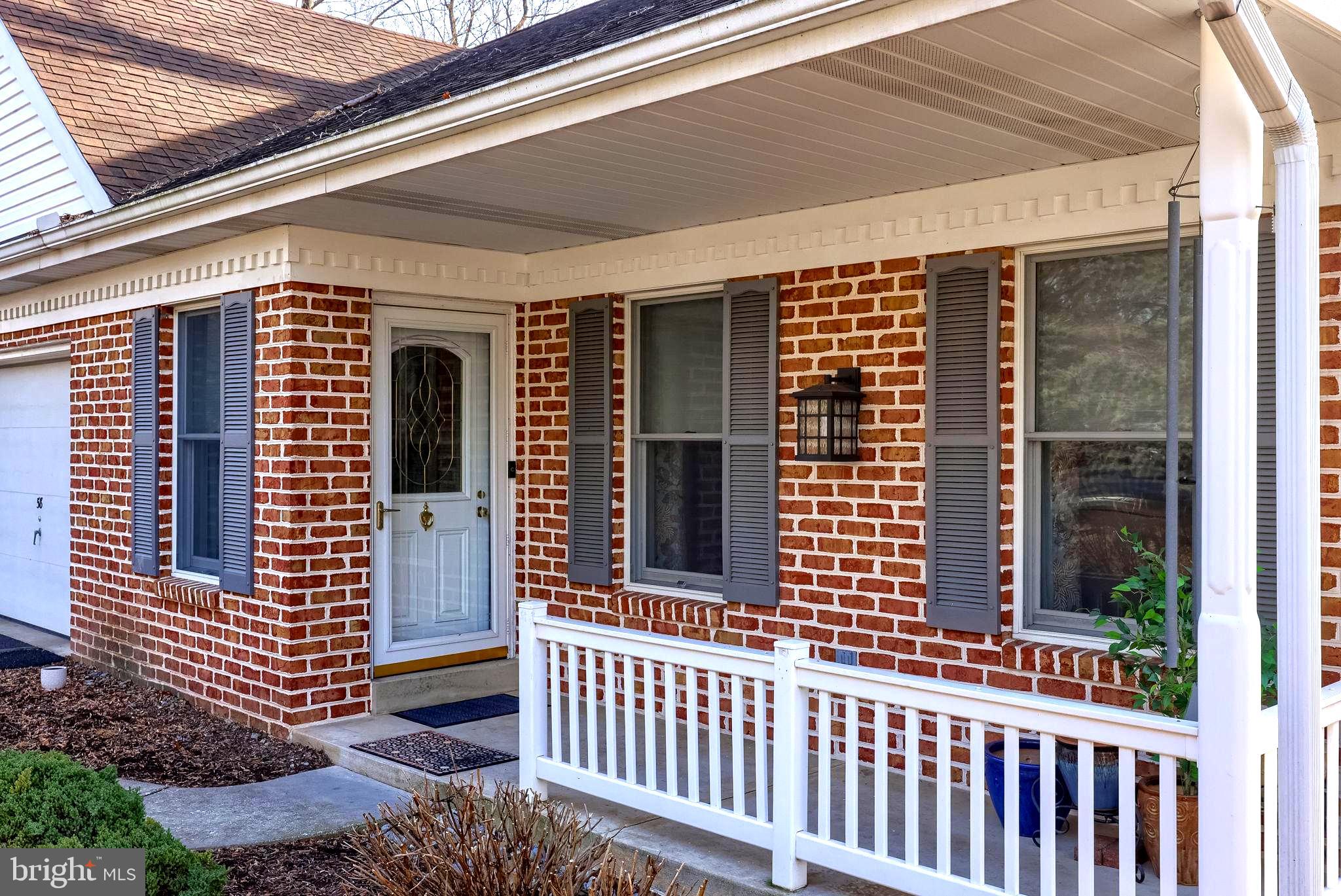 58 Timber Villa Elizabethtown, PA 17022 - Photo 2 of 60 a view of a porch with a chair and swing