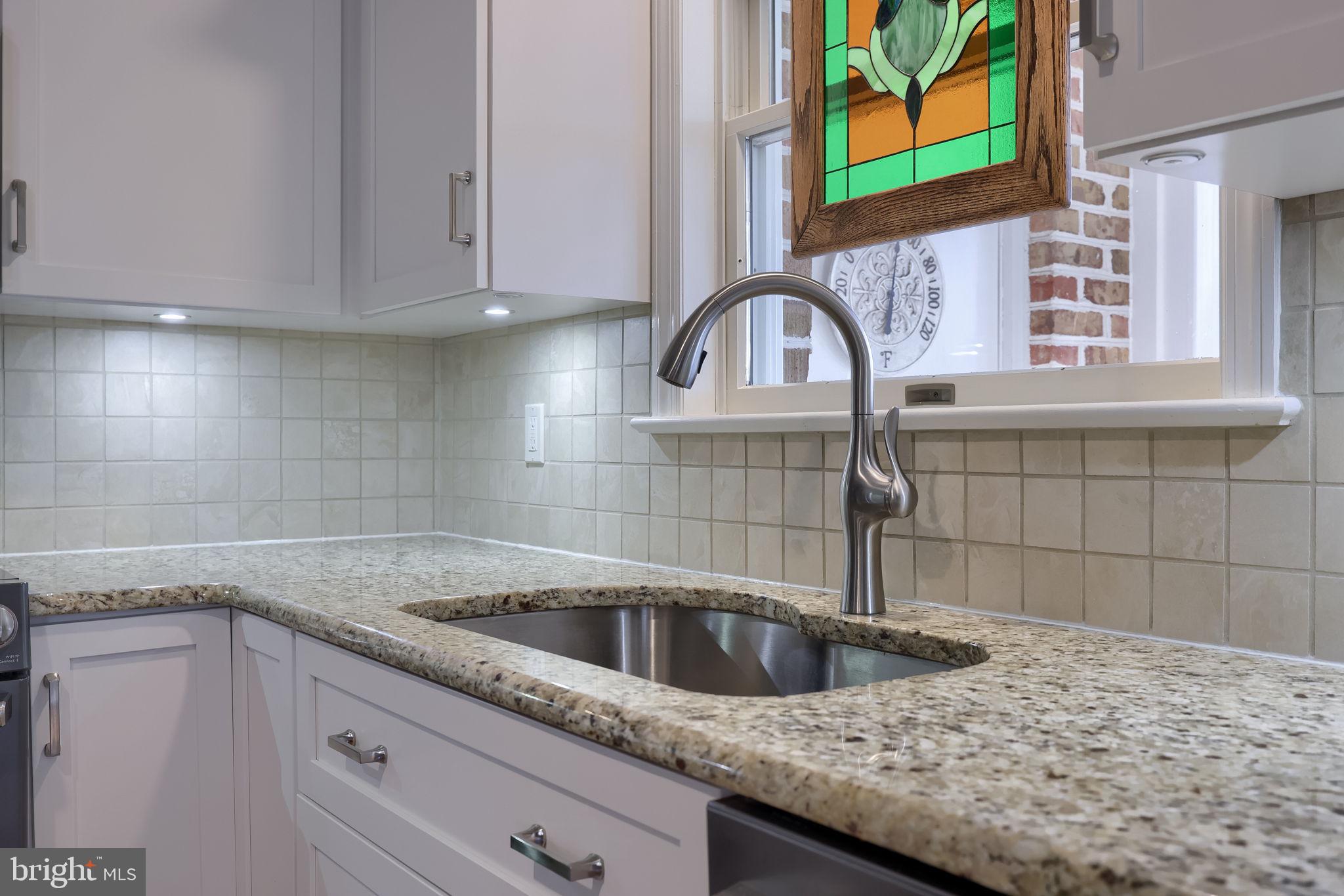 58 Timber Villa Elizabethtown, PA 17022 - Photo 26 of 60 a kitchen with stainless steel appliances granite countertop a sink and a wooden cabinets