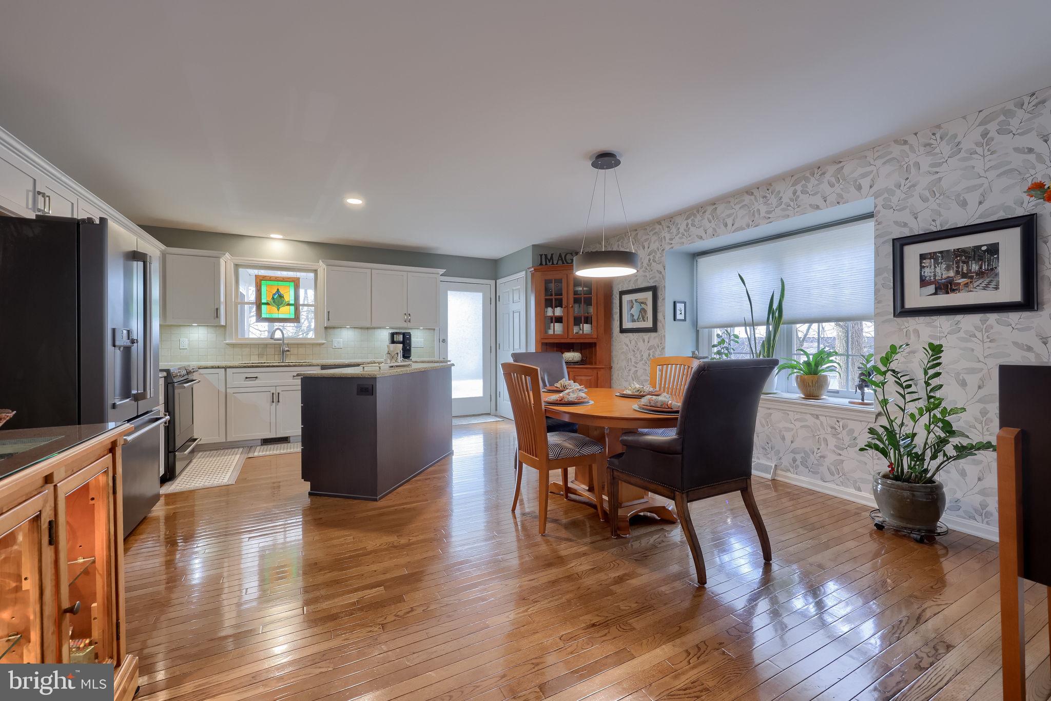 58 Timber Villa Elizabethtown, PA 17022 - Photo 30 of 60 a view of a dining room with furniture window and wooden floor