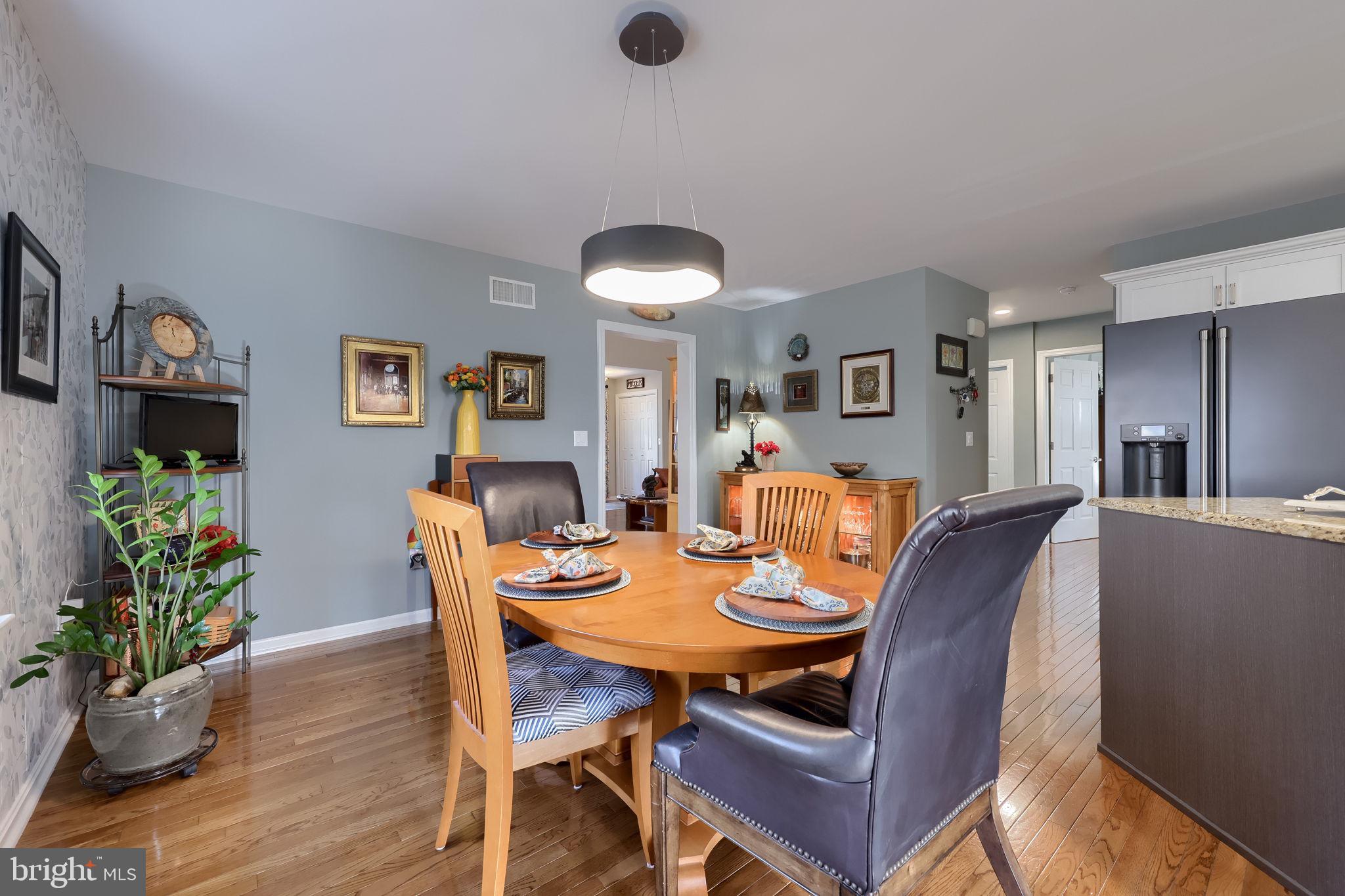 58 Timber Villa Elizabethtown, PA 17022 - Photo 32 of 60 a view of a dining room with furniture and wooden floor