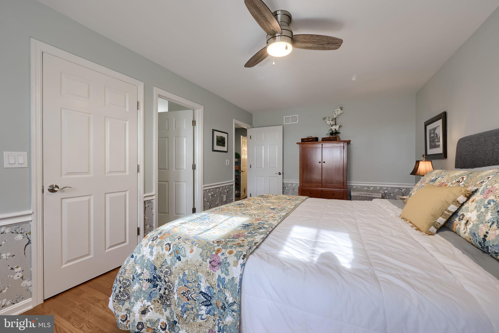 58 Timber Villa Elizabethtown, PA 17022 - Photo 38 of 60 a bed room with a bed and a chandelier