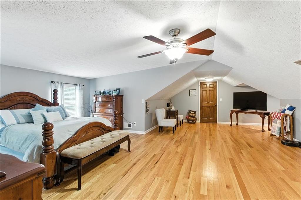 4970 Nebo Road Hiram, GA 30141 - Photo 15 of 61 a living room with furniture and a flat screen tv