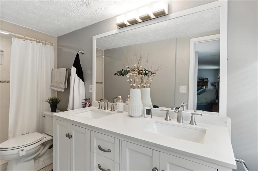 4970 Nebo Road Hiram, GA 30141 - Photo 18 of 61 a bathroom with a sink and a mirror