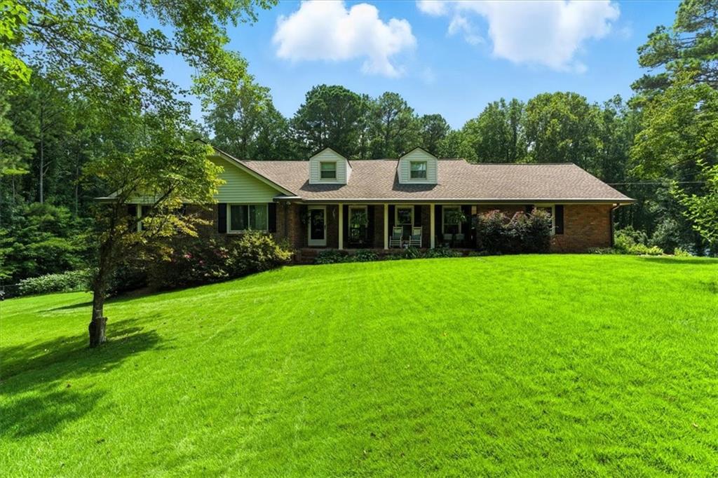4970 Nebo Road Hiram, GA 30141 - Photo 2 of 61 a view of house with a garden