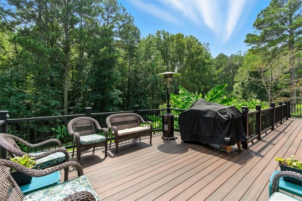 4970 Nebo Road Hiram, GA 30141 - Photo 28 of 61 a view of a roof deck with couches and wooden floor