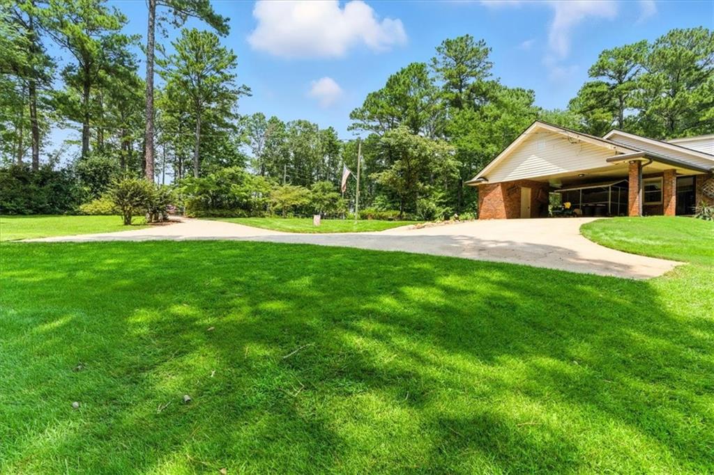 4970 Nebo Road Hiram, GA 30141 - Photo 40 of 61 a front view of a house with a yard and trees