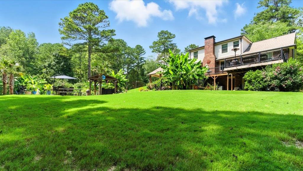 4970 Nebo Road Hiram, GA 30141 - Photo 41 of 61 a front view of a house with garden