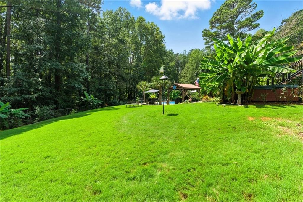 4970 Nebo Road Hiram, GA 30141 - Photo 44 of 61 a view of a golf course with a house