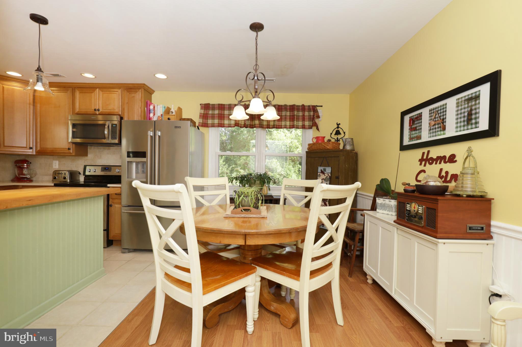 8576 Adamson Street Manassas, VA 20110 - Photo 11 of 37 Open to Kitchen