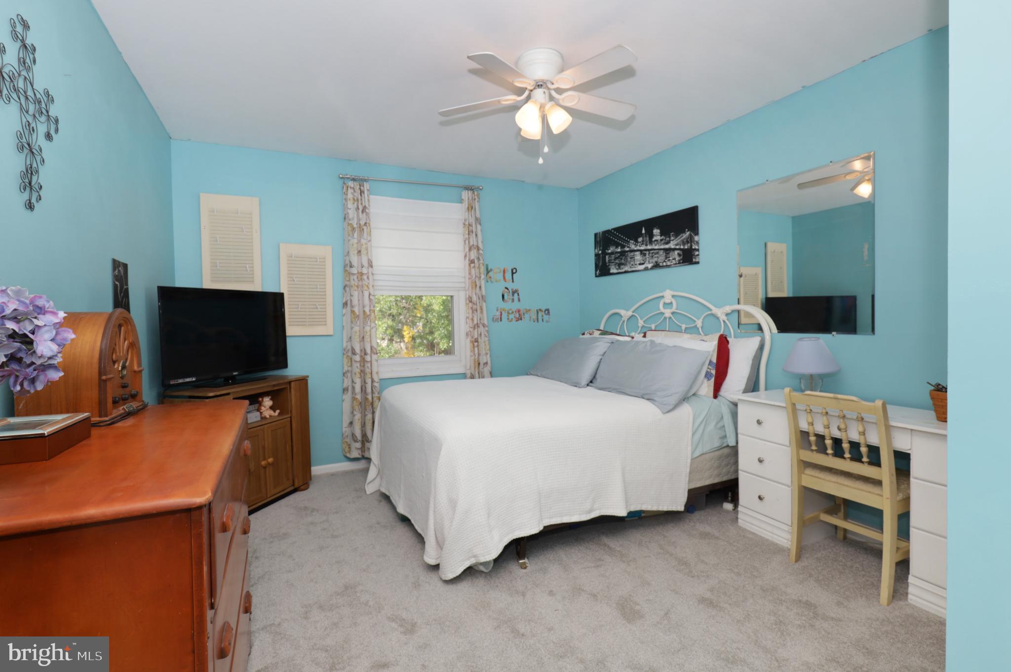 8576 Adamson Street Manassas, VA 20110 - Photo 25 of 37 Bedroom 2 With Fan/Light and Carpet