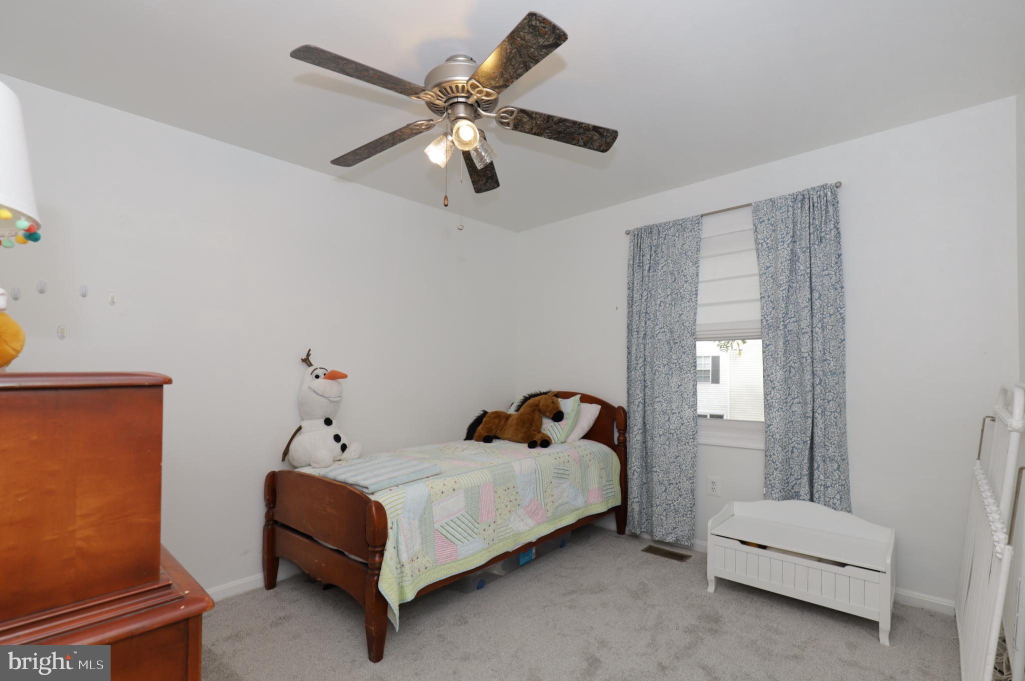 8576 Adamson Street Manassas, VA 20110 - Photo 30 of 37 Bedroom 3 With Fan/Light and Carpet