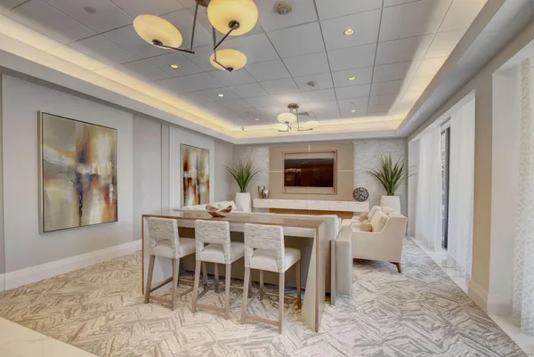 a view of a dining room with furniture