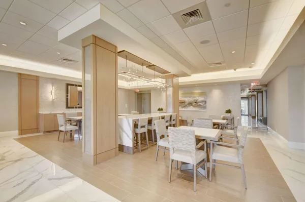a view of a dining room with furniture