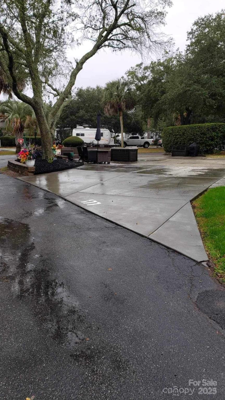 43B Jenkins Island Road, Unit 177 Hilton Head Island, SC 29926 - Photo 6 of 17 a view of street with parked cars