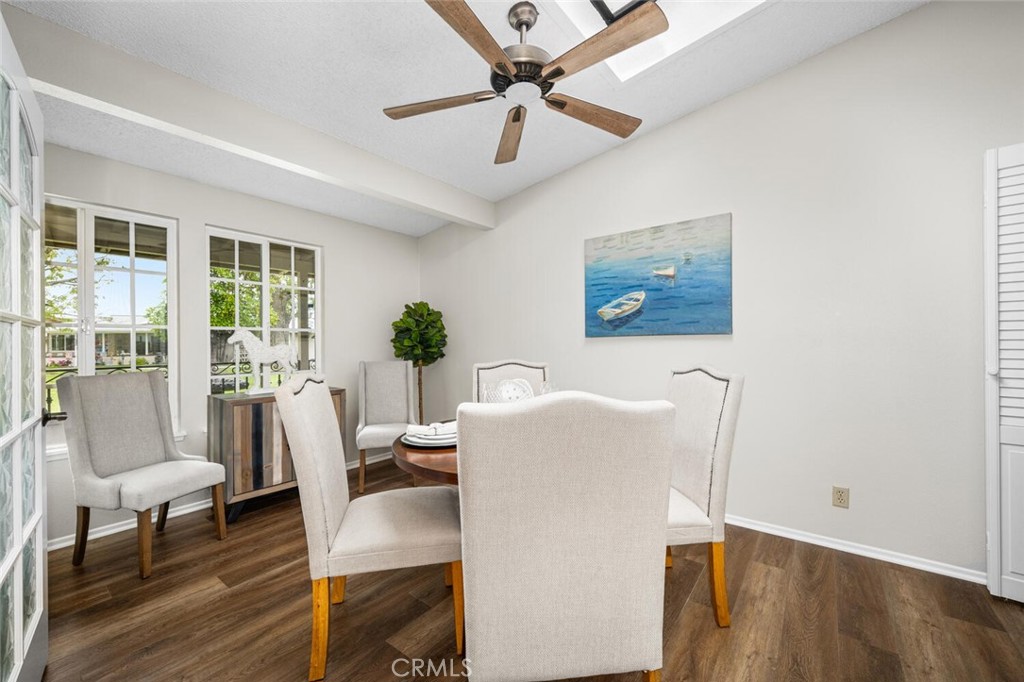 1621 Interlachen Road, Unit 265B Seal Beach, CA 90740 - Photo 17 of 36 a dining room with furniture and window