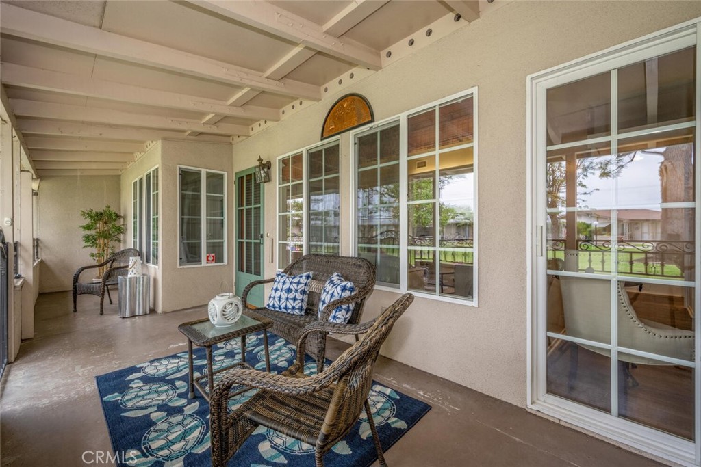 1621 Interlachen Road, Unit 265B Seal Beach, CA 90740 - Photo 9 of 36 a dining room with furniture and window