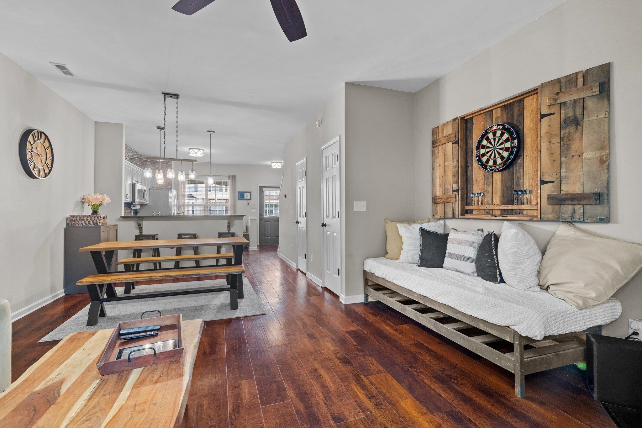 1750 Sorrell Brook Way Raleigh, NC 27609 - Photo 15 of 32 a living room with furniture and a chandelier