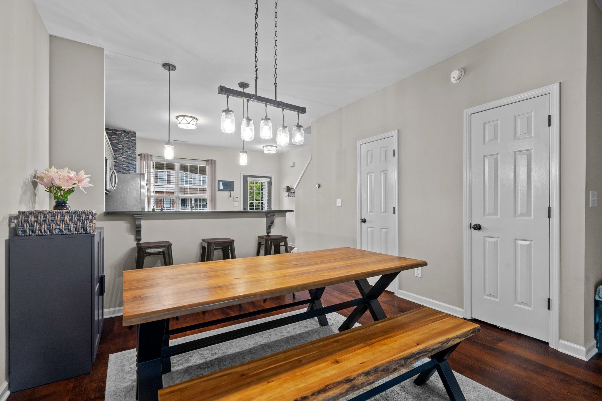 1750 Sorrell Brook Way Raleigh, NC 27609 - Photo 16 of 32 a view of a dining room with furniture and wooden floor