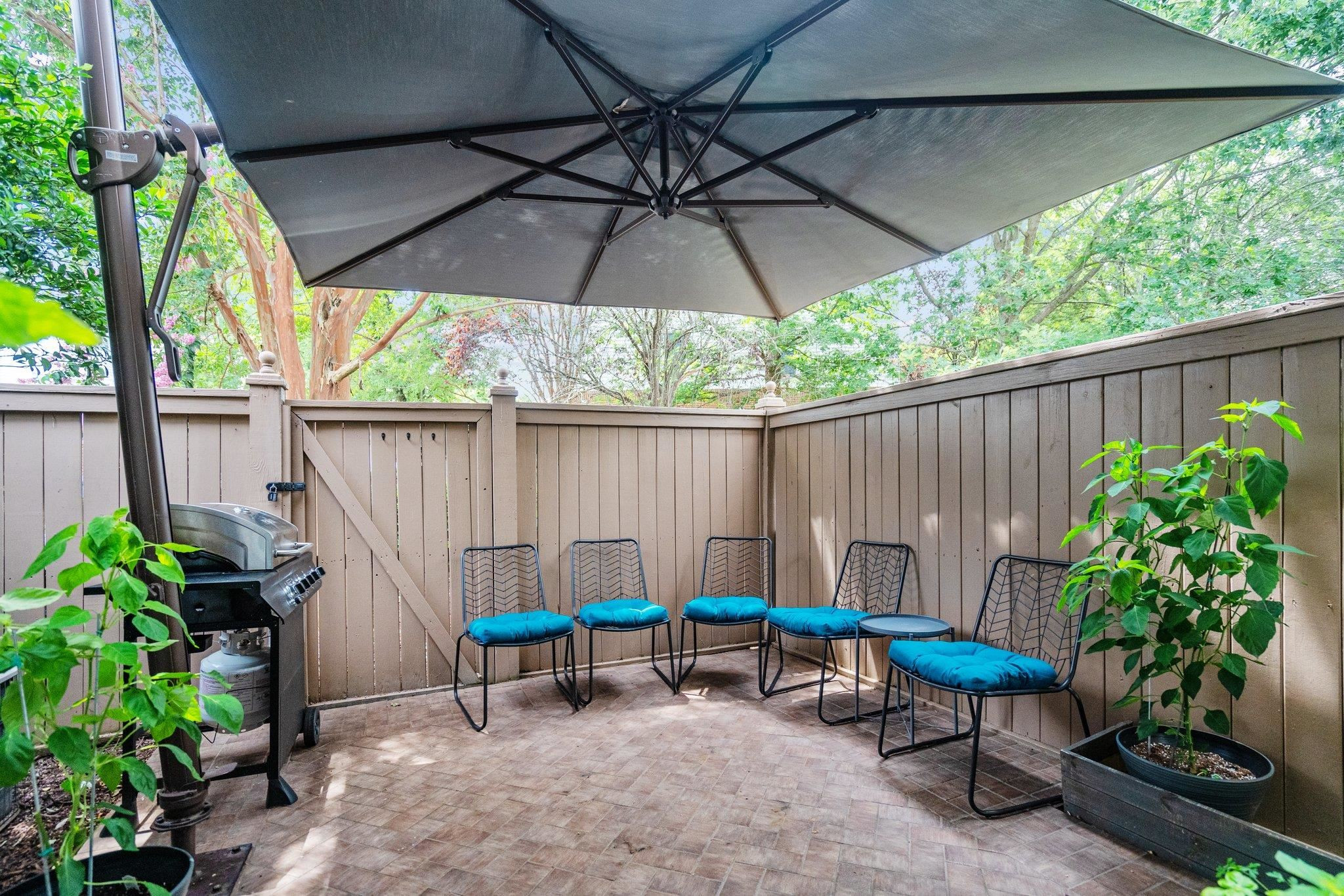 1750 Sorrell Brook Way Raleigh, NC 27609 - Photo 17 of 32 a backyard view with a seating space