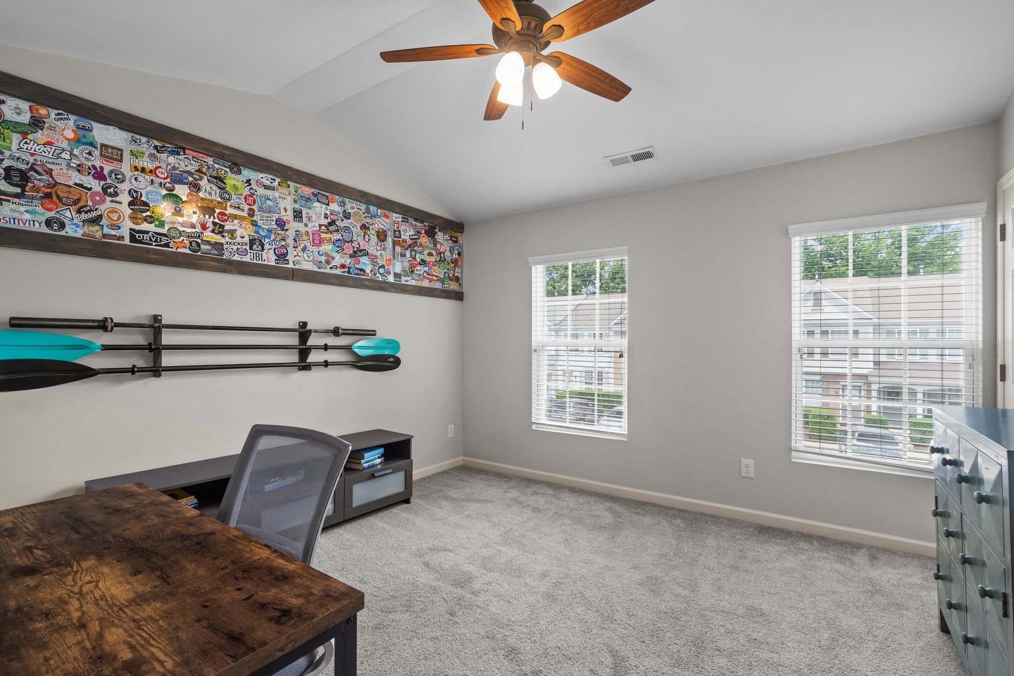 1750 Sorrell Brook Way Raleigh, NC 27609 - Photo 25 of 32 a workspace with wooden floor and windows