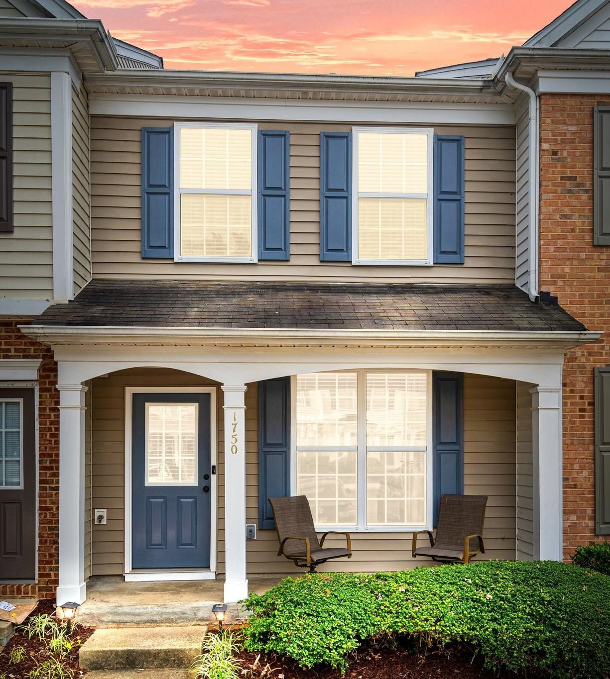 1750 Sorrell Brook Way Raleigh, NC 27609 - Photo 29 of 32 a front view of a house with a yard