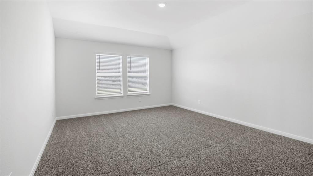1921 Reveille Way Terrell, TX 75160 - Photo 22 of 25 an empty room with a window