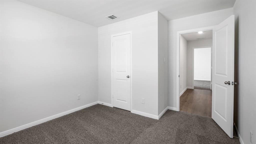 1921 Reveille Way Terrell, TX 75160 - Photo 6 of 25 an empty room with closet