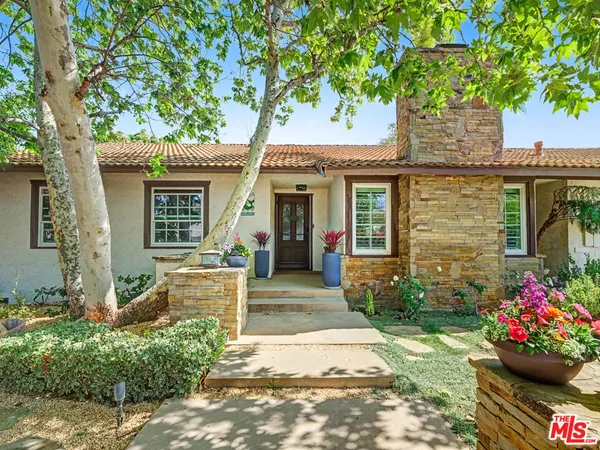 a front view of a house with a porch