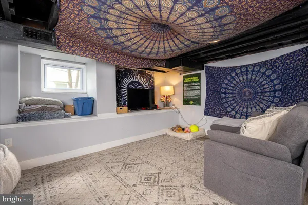 a living room with furniture and a couch