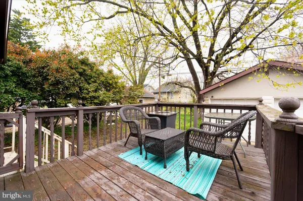 a view of a chairs and table on the wooden floor