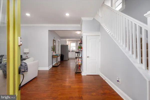 a view of a hallway view with living room