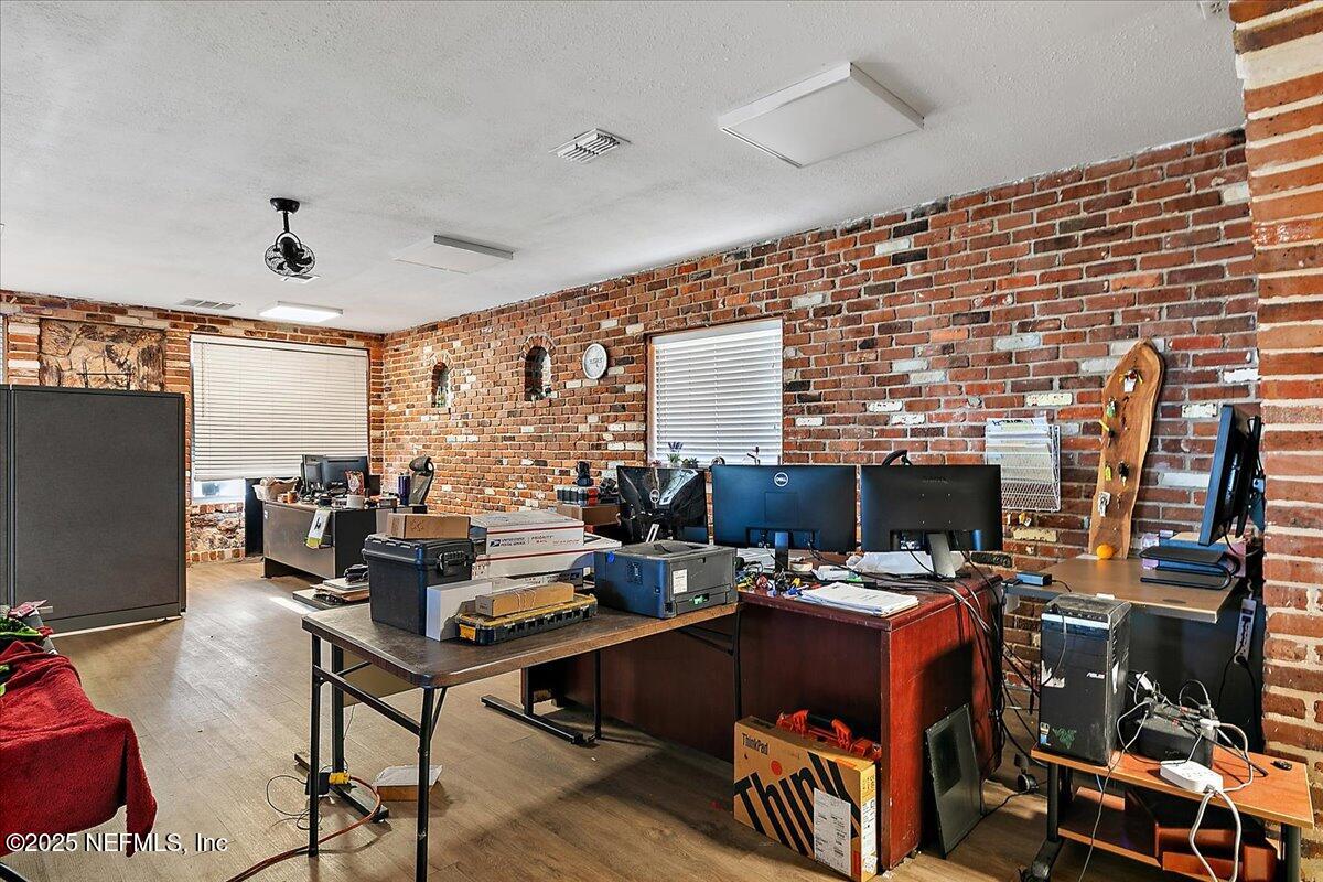 5070 Elinor Road Jacksonville, FL 32257 - Photo 6 of 10 a view of a workspace with furniture