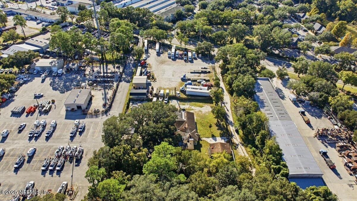 5070 Elinor Road Jacksonville, FL 32257 - Photo 7 of 10 an aerial view of a house with a yard