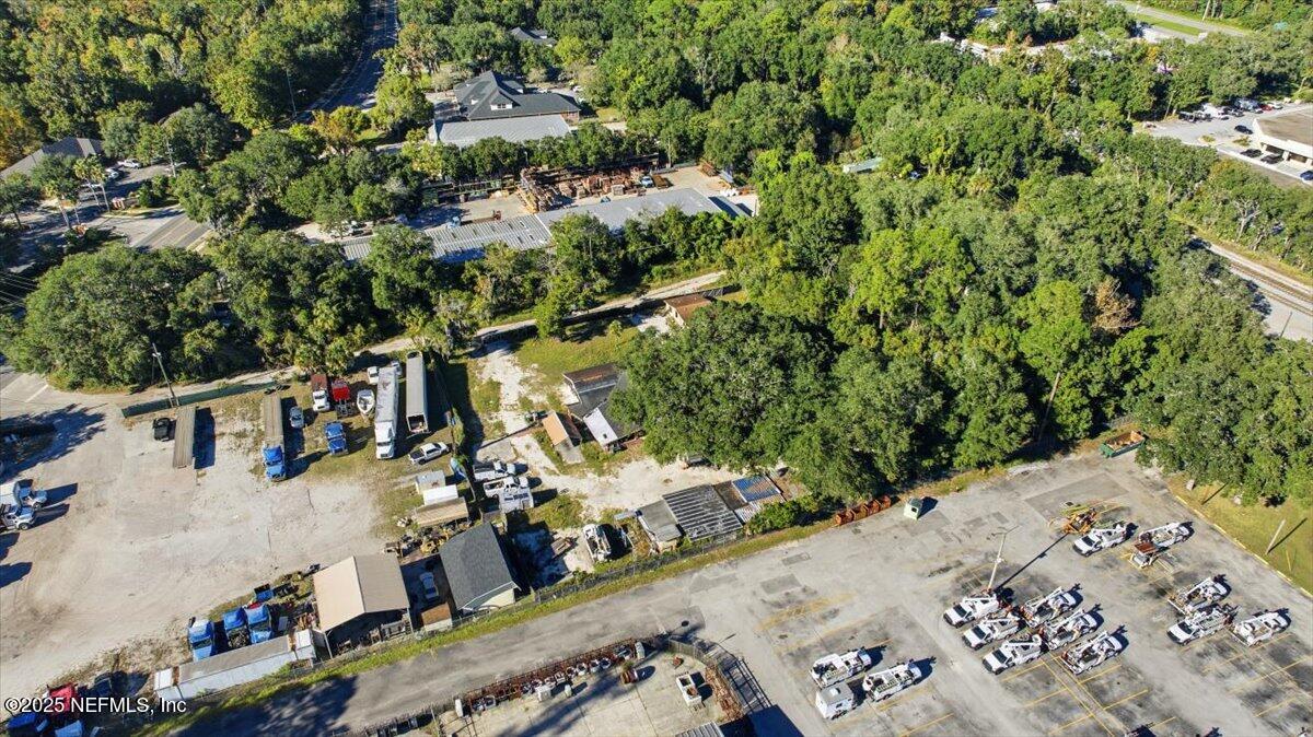 5070 Elinor Road Jacksonville, FL 32257 - Photo 9 of 10 an aerial view of a house with a yard