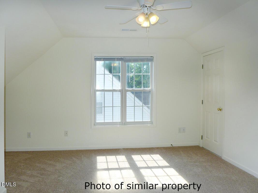 300 Davie Road Carrboro, NC 27510 - Photo 12 of 16 an empty room with a window