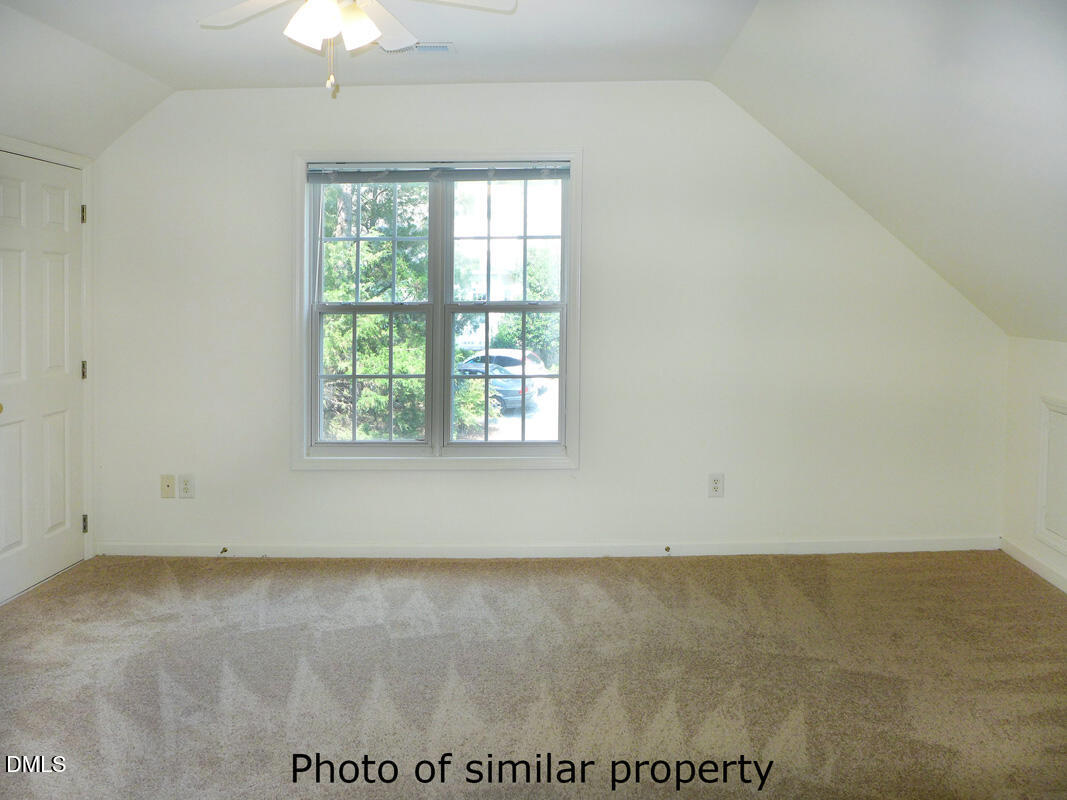 300 Davie Road Carrboro, NC 27510 - Photo 13 of 16 an empty room with a window
