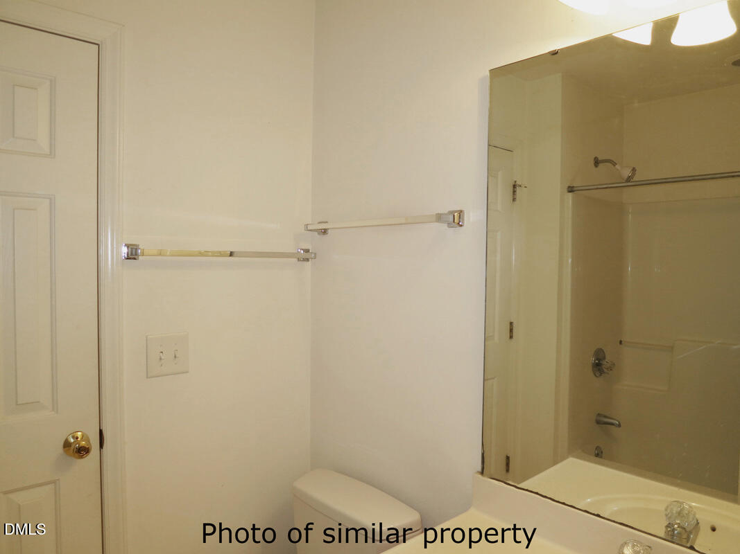 300 Davie Road Carrboro, NC 27510 - Photo 14 of 16 a bathroom with a shower