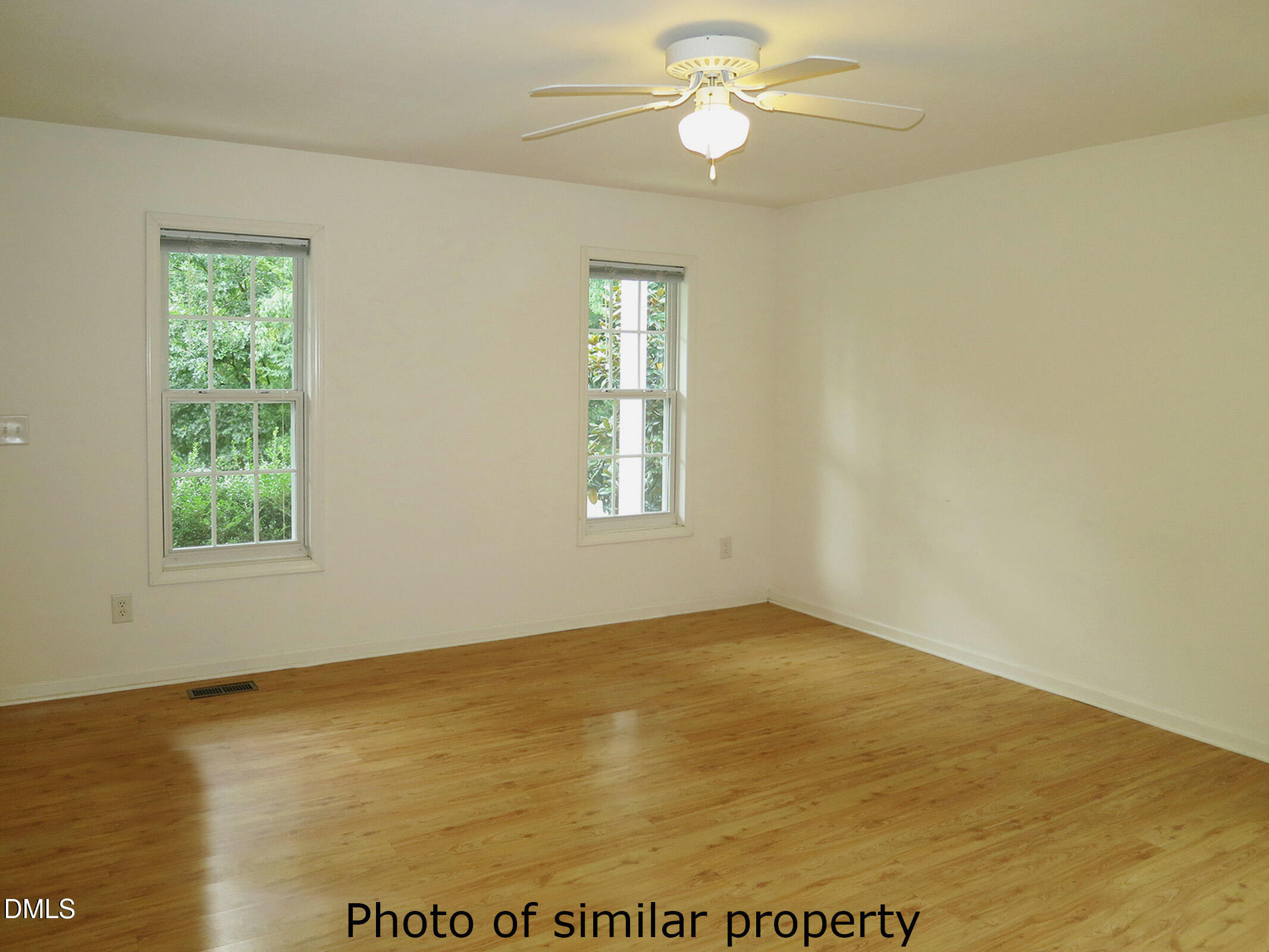 300 Davie Road Carrboro, NC 27510 - Photo 3 of 16 a view of an empty room with a window