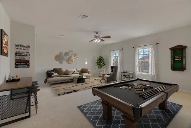 a room with furniture and a flat screen tv