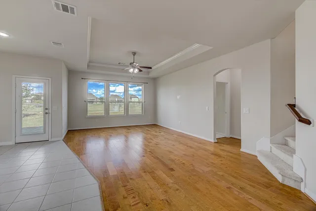 a kitchen with stainless steel appliances granite countertop a sink and a stove